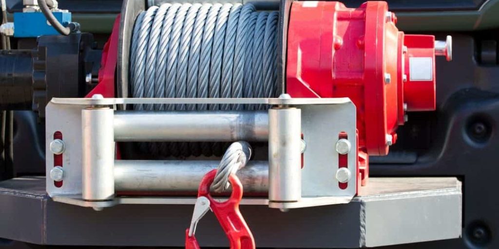 What a Winch Does That Traction Mats Can’t